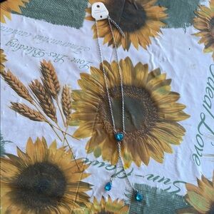 Silver Necklace with Blue Teardrop Pendants